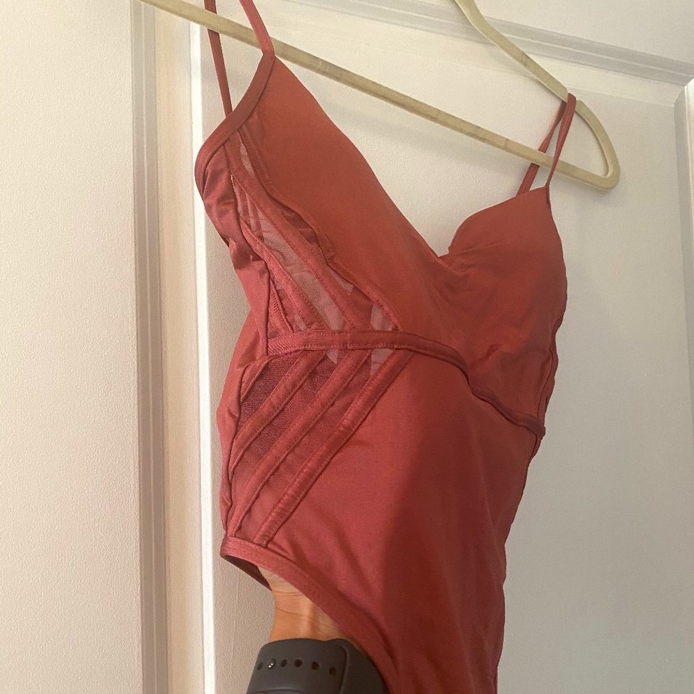 BCBGMaxAzria pink One-Piece Swimsuit with Sheer Side Panels